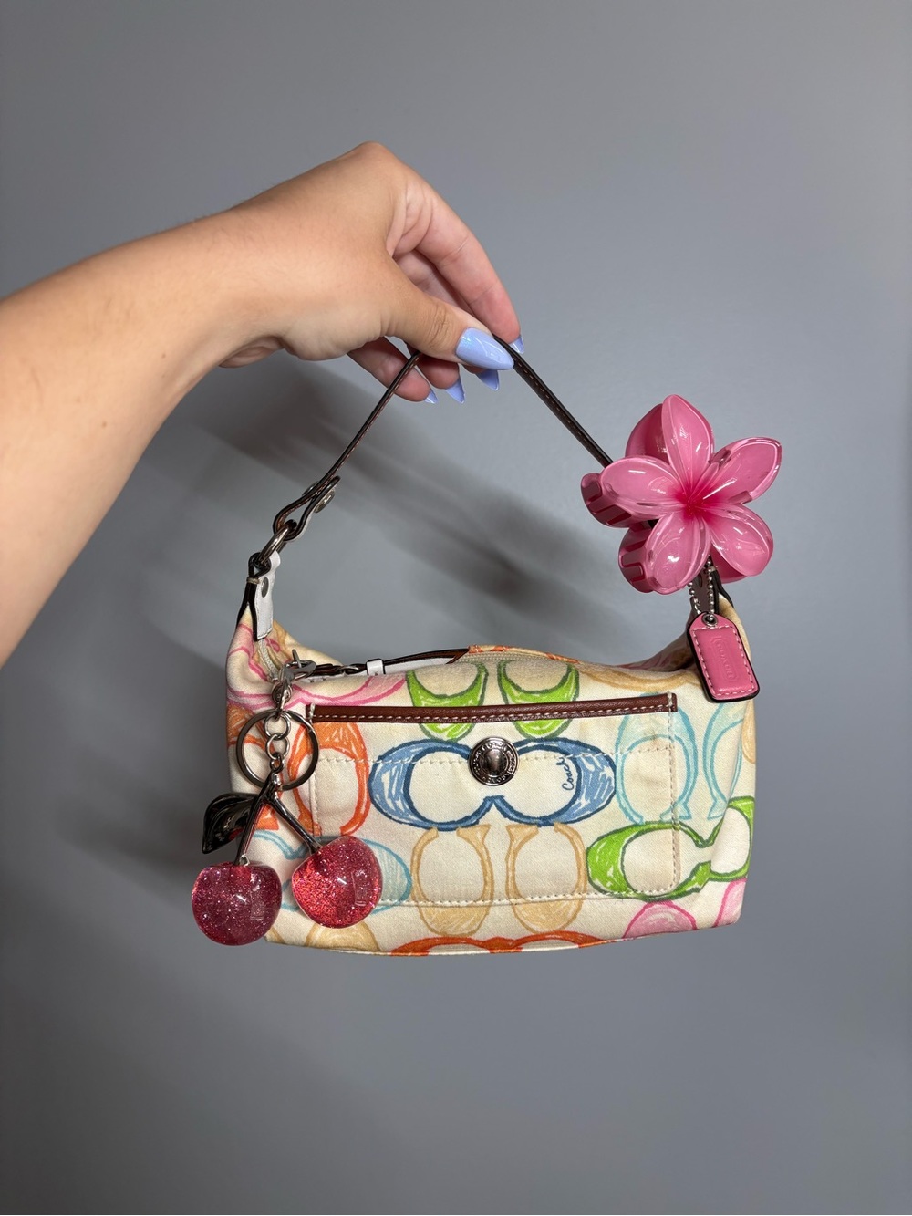 Coach Y2K Multicolor Signature Mini Bag with Pink Flower Charm